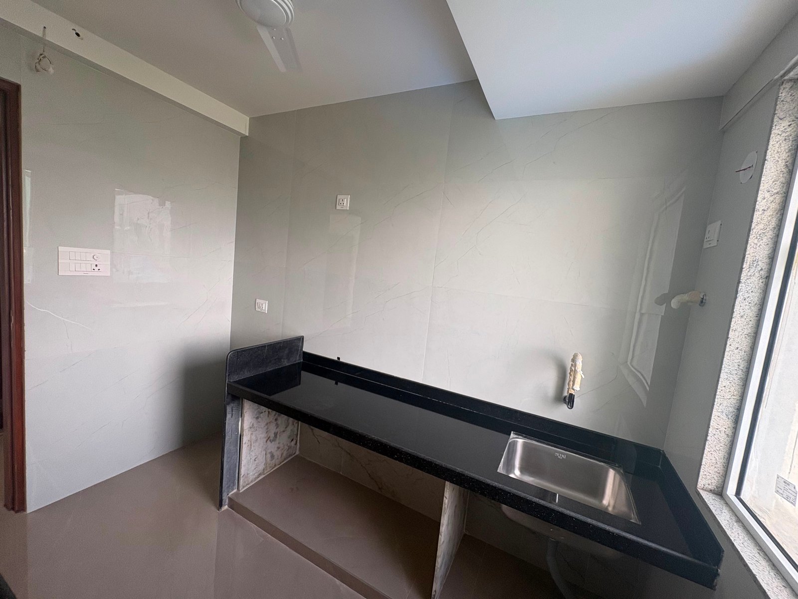 Wall tile laying and cladding work